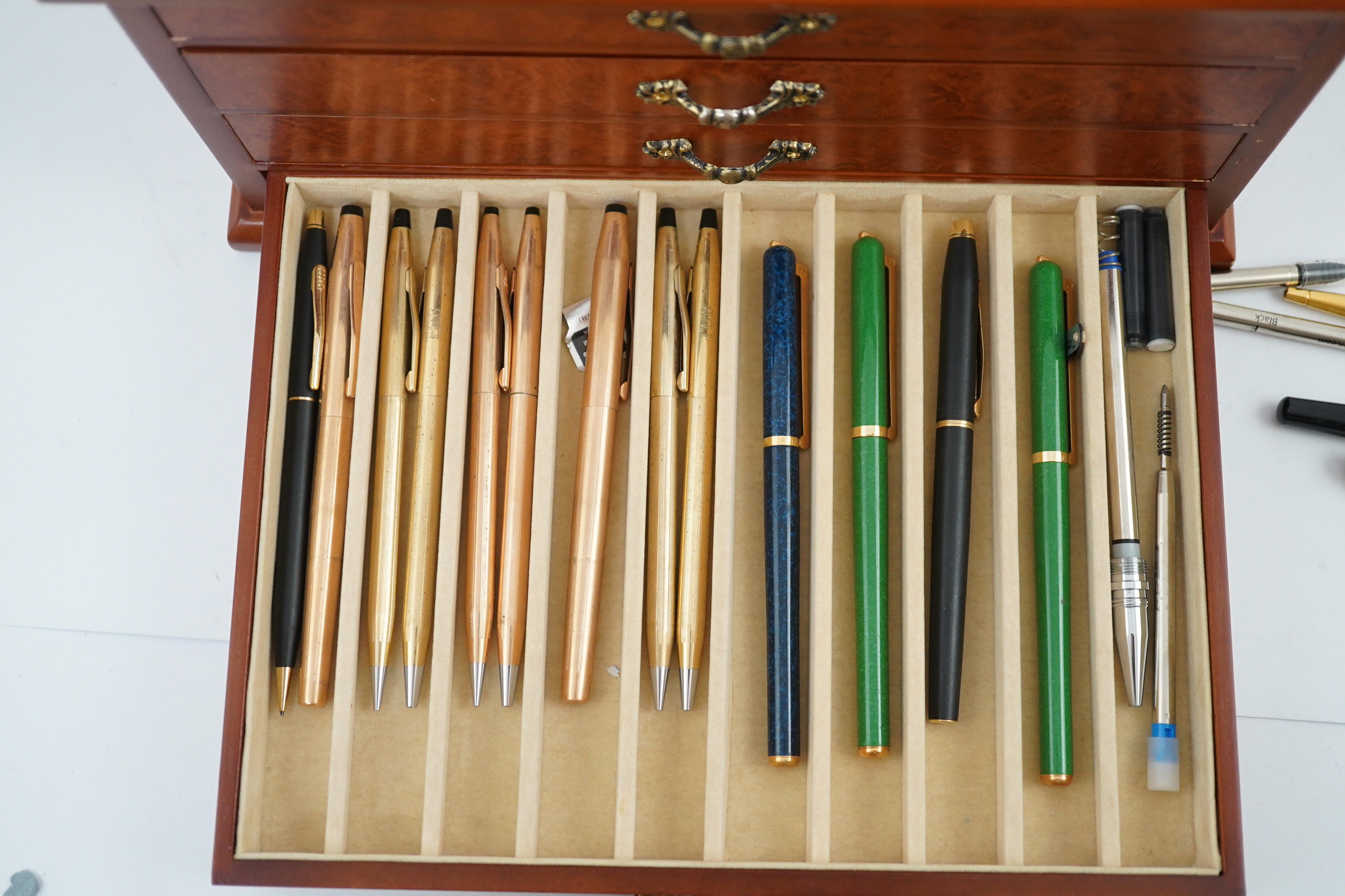 A large quantity of pens etc. and collector's cabinet